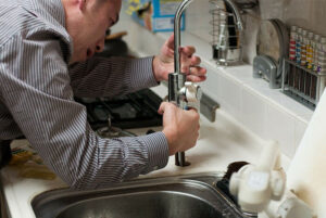 Experienced plumber repairing kitchen sink plumbing for a residential property in Emerald, Queensland. Nash Plumbing & Civil provides professional kitchen plumbing repairs, leaking tap repairs, blocked sink solutions, pipe replacements, drain cleaning, and complete residential plumbing services throughout Emerald and surrounding areas.