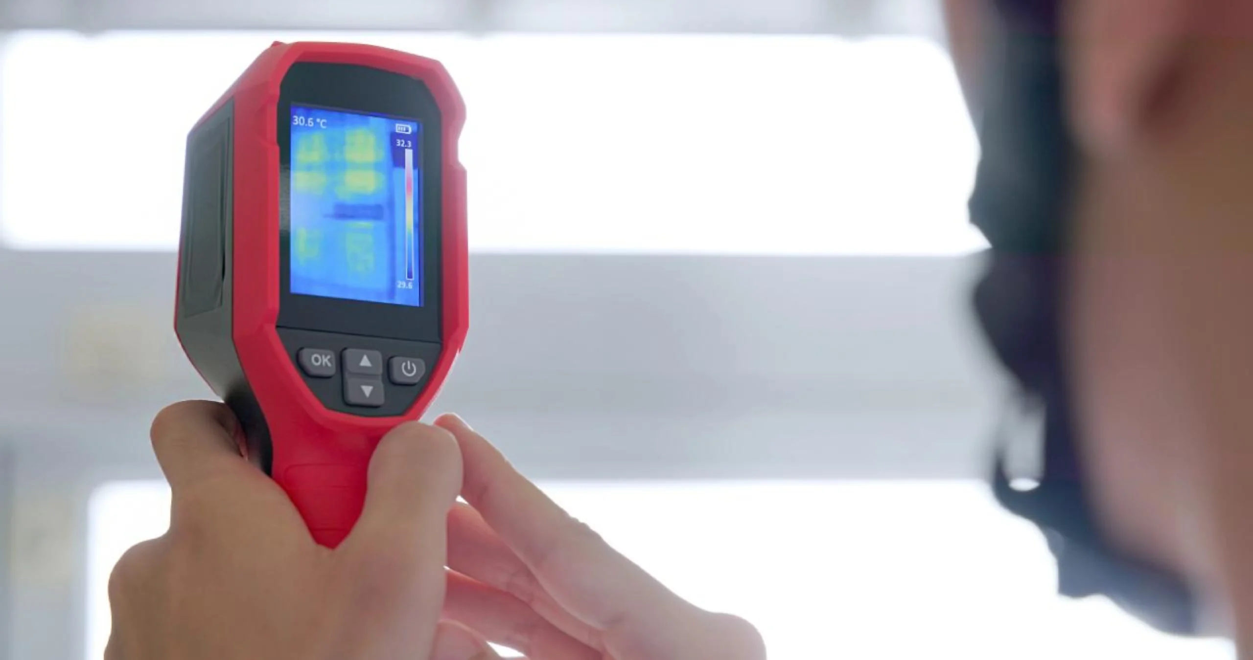 Plumber using thermal imaging technology for water leak detection in Emerald, Queensland.